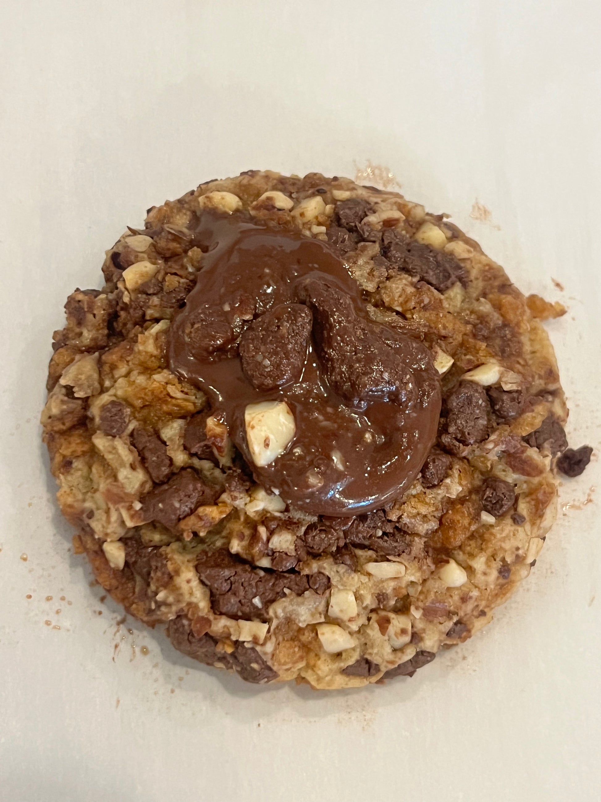 A gorgeous full body shot of the Get Ur Toffee On cream cheese cookie with toffee AND almonds.  Available with or without nuts (almonds).