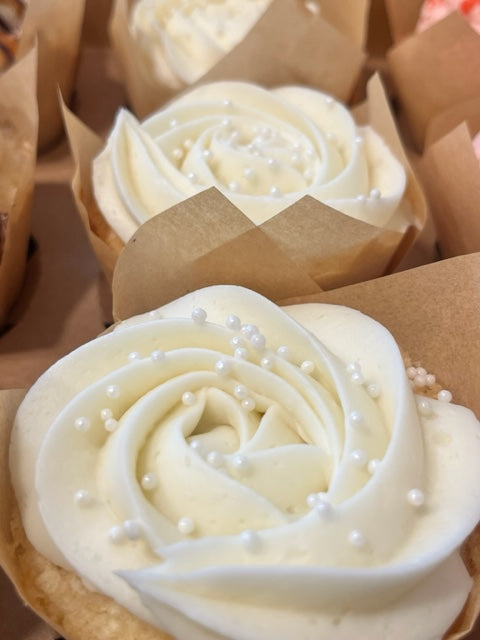 Very Vanilla cupcakes in a pastry box ready to be picked up.