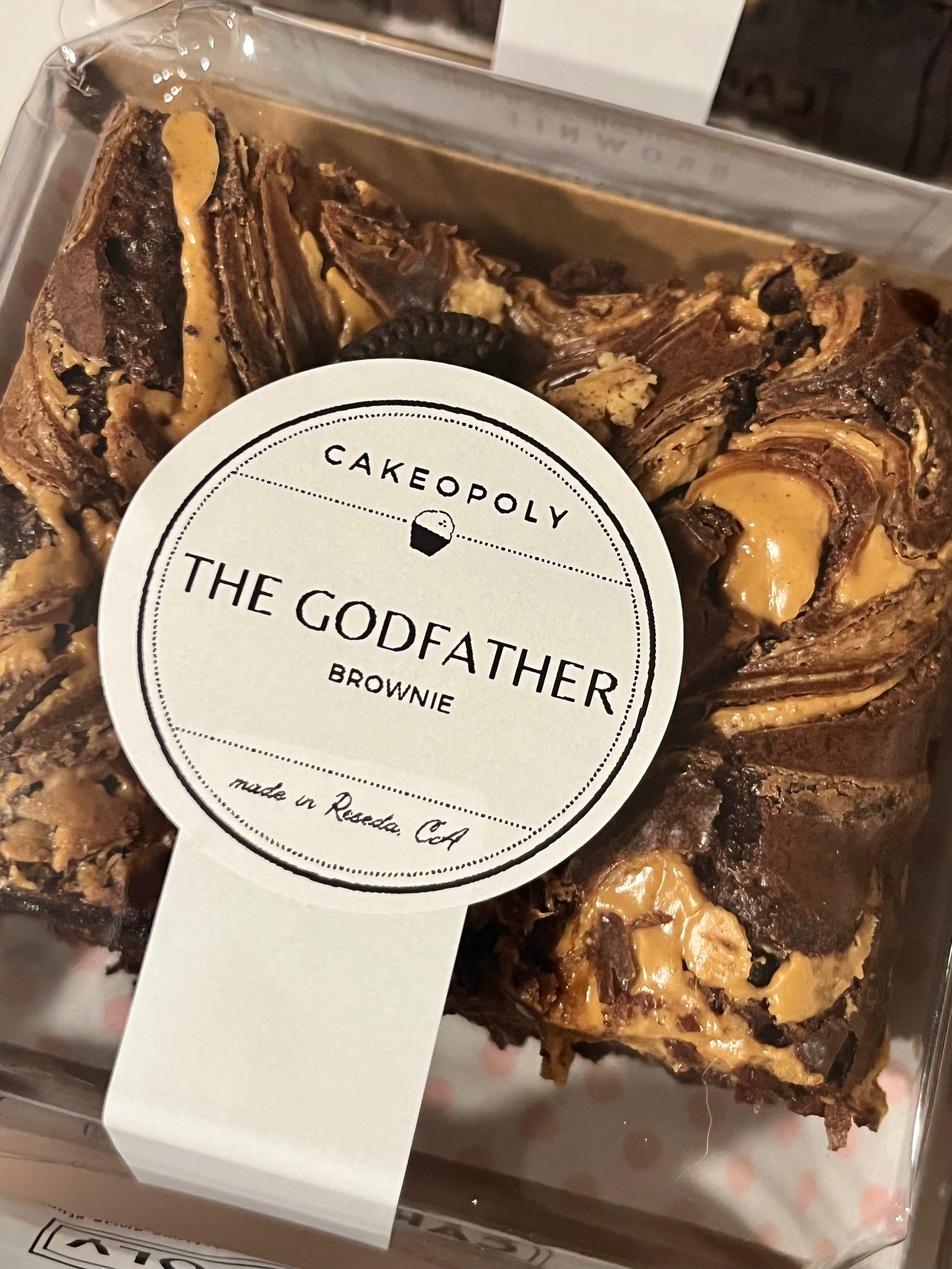 Brownie with a 'The Godfather' label on clear packaging...the ultimate peanut butter chocolate brownie for dessert.
